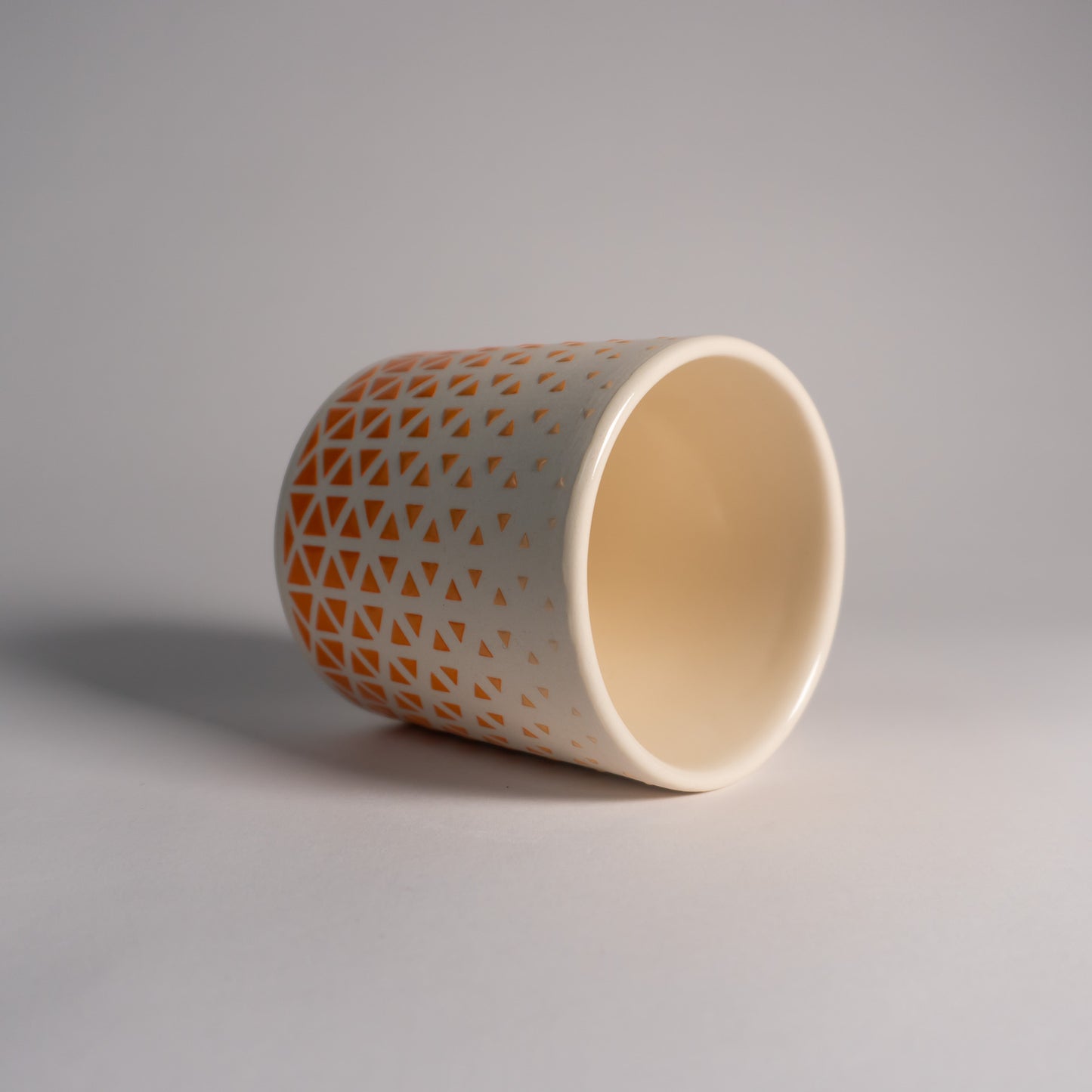 Orange Fade Triangles Tumbler